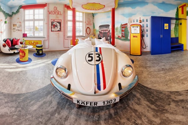 V8 Hotel - In this photo the gas stations suite is shown with Herbie-bed gas pumps and neon light