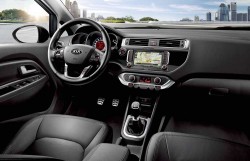 kia_rio_pe_my15_3_4_dashboard_view_(black_leather)_6089_30830