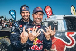 stéphane-peterhansel-celebrates-his-dakar-2016-victory-with-team-mate-cyril-despres