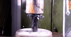 Crushing carbon fiber with hydraulic press