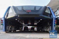 TEB - World First Elevated Super-Bus Hits The Road In China (1)