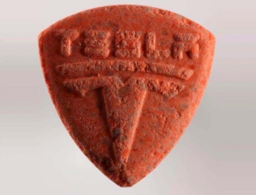 Ecstasy pills with Tesla logo