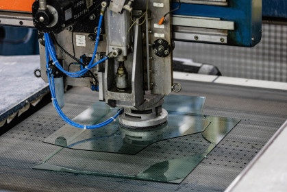 The plate glass is processed into new automotive glass.