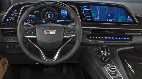 The 2021 Cadillac Escalade showcases the first curved OLED in the industry with 38” of total diagonal display. It consists of a 7.2-in. driver information display, a 14.2-in unit behind the steering wheel, and a 16.9 –in center display.