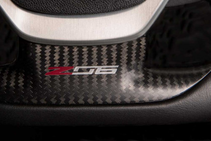 The 2015 Corvette Z06 features a unique, flat-bottomed steering wheel with genuine carbon fiber accents.