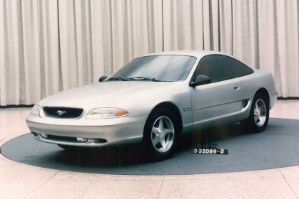 In 1990, Ford designers evaluated a number of themes for a replacement for the long-running third-generation Mustang. The notchback and hatchback bodystyles would be replaced with a single fastback coupe format. After departing from many of the original design cues on the third-generation models, the upcoming fourth-generation would return elements like the galloping pony in the grille, the side scoops and the tri-bar taillamps. This softer concept, known as ÎÎÎ²âÂ¬ÎâºBruce JennerÎÎÎ²âÂ¬ÎÂ¥ wasnÎÎÎ²âÂ¬Î²âÎt considered aggressive enough to be a Mustang.