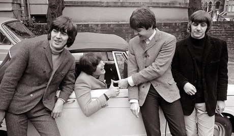 The Beatles by John Lennon's car after he passed his L-test 1965