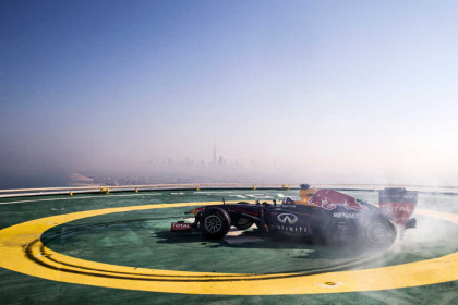 David Coulthard of Scotland performs in a Formula 1 car on the helipad on top of Burj Al Arab hotel in Dubai, United Arab Emirates on October 30, 2013
